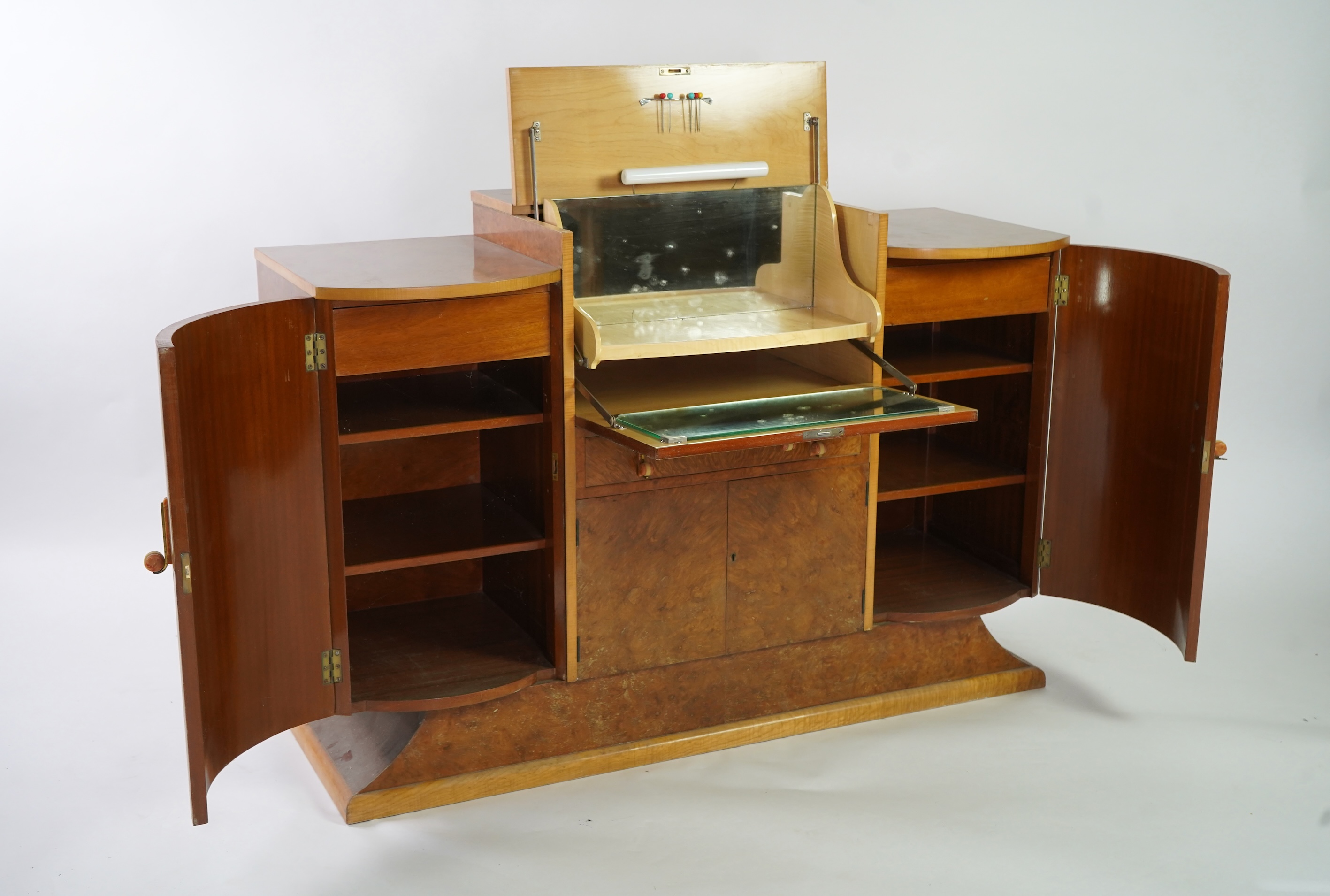 Attributed to Harry and Lou Epstein: An Art Deco burr walnut dining suite